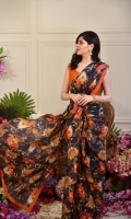 This gorgeous saree is adorned on Pure Medium Silk, paired with Pure raw silk blouse in a deep tone of burnt orange.