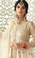 A Dew white net peshwas with gota worked bodice. It is paired with jamawar pants and kamdani dupatta.