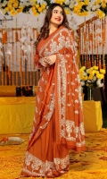 Shaadi season is incomplete without Saree. A unique combination of tangerine Saree with off white thread work will make your festive more elegant. 