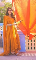 Burnt orange chikan angarkha with puffy sleeves, paired with a churidar pyjama and chiffon dupatta.
