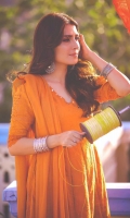 Burnt orange chikan angarkha with puffy sleeves, paired with a churidar pyjama and chiffon dupatta.