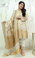 Organza box Kurta with an all over embellished jaal on the front and pleated gold borders paired with our raw silk organza scallop pants. Dupatta is organza jaguar infused with mirror and pleated detailing.