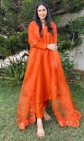 Crisp spectrum orange raw silk matching separates paired with a sheer organza appliquéd lace border dupatta.