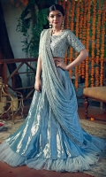 A modern Swarovski embellished ice blue honeycomb choli paired with a ruffled lehenga and an ice blue heavy embroidered dupatta.