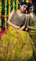 A beautiful gota work golden choli with fresh lime green color with fuchsia and orange work and booti chan lehenga.