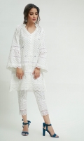 A traditional white Chikan Kurta with beautiful mirror work encrusted alongside the borders with laces. Paired with straight lace embellished chikan pants