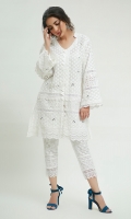 A traditional white Chikan Kurta with beautiful mirror work encrusted alongside the borders with laces. Paired with straight lace embellished chikan pants