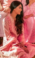 Taffy pink schiffli anarkali with a sweetheart neckline and puffed sleeves paired with pants and a chiffon block printed dupatta.