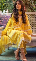 Pineapple yellow schiffli kurta with white embellishments paired with pants and a chiffon block printed dupatta.