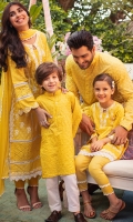 Pineapple yellow schiffli kurta with white embellishments paired with pants.