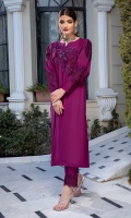 A chic and classy composition is portrayed in the Magenta ensemble on cotton silk fabric illustrates enriched embroidery. Bodice self-made embellished with floral motifs and beads details. Delicate embroidery on puff sleeves will give you a dreamy look. It's accompanied by a cotton silk trouser with embroidered patch on the hemline.