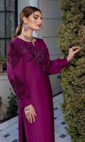 A chic and classy composition is portrayed in the Magenta ensemble on cotton silk fabric illustrates enriched embroidery. Bodice self-made embellished with floral motifs and beads details. Delicate embroidery on puff sleeves will give you a dreamy look. It's accompanied by a cotton silk trouser with embroidered patch on the hemline.