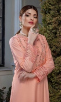 This beautiful airline long shirt in peach colour is rendered on cotton silk fabric decorated with kora, dabka and beads all over the bodice. The shirt is further enhanced with embroidered slits and hemline. It comes with an embroidered cotton silk trouser.