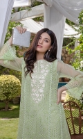 A fascinating composition is illustrated on the schifilli mint organza canvas. The shirt is gracefully adorned with a floral embroidered neckline and bottom. It comes with scalloped pleated raw silk straight pants. This elegant ensemble is an ideal choice to style at festive occasions. The sleeves lining comes with the product and can be attached if needed.