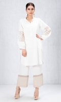 White grip silk shirt with lace adorned sleeves and pearl button detailing accompanied by white and beige colour block pants in grip silk