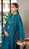 This graceful kurta adorned with blue and gold thread embroidery alongside the panels, features stitches on the neck along with sheesh buttons and handcrafted resham tassels to give the kurta the right amount of elegance. It is paired with straight pants and a pure organza dupatta with enticing textures of a contrasting block printed border for the festive season of eid.