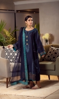 The navy blue kurta is made from pure cotton featuring turquiose and gold embroidery on the neck and is incorporated with gold metallic buttons which is further enhanced with feroza danglings. The kurta is featuring a block printed border on the damaan and sleeves to exude versatile and timeless elegance. It is paired with straight pants and a pure matching organza dupatta featured with tuquiose block printed edgings.
