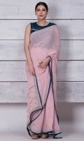 Pure georgette sari heavily worked in kundan and kora dabka; blouse is inclusive.