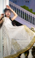Pure off-white net in self-print design shirt; appliqued and heavily hand worked in dull gold, finished with dull gold boarder. Raw silk pants.  Pure chiffon stole