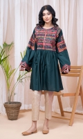 A fun green embroidered frock with gathers on the flare and heavy embroidery on the yoke and sleeves.