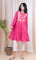A hot pink cambric frock with an embroidered yoke and spray on the flare.