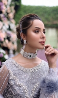-Embroidered and hand embellished front yoke (net) -Embroidered and sequinned back yoke (net) -Pani embroidered and sequinned sleeves (net) -Embroidered and sequinned net for peplum -Pani embroidered and sequinned lehnga front (net) -Embroidered and sequinned lehnga back (net) -Pani embroidered and sequinned patti for panel inserts (net) -Pani embroidered and sequinned organza border -Pani embroidered and sequinned lace for finishing (organza) -Sequinned and pearl embellished ready to wear net dupata -Dyed jamawar lehnga -Pearls for finishing