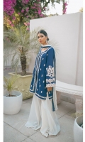 Ocean blue jacket with ivory silk thread embroidery on the sleeves, front and back. Lawn cotton lining , and gharara with tie dyed chiffon dupatta in blue and white .