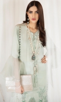 Mint paneled cotton net shirt tucked with organza patch at the border of the front panel has oversized organza sleeves with side and front slits paired with Pk raw silk pants.