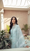SERENE BLUE NET SHIRT WITH FLORAL AND SCENIC EMBROIDERY ADORNED WITH PEARLS, CRYSTAL AND SWAROVSKI. RAW SILK SLIP ORGANZA PRINTED DUPATTA WITH ELABORATE HAND WORK AND BLOCK PRINT. RAW SILK TAPERED PANTS