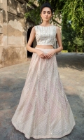 Stitched  peach colored blouse and lehenga is fully encrusted with detailed mirror, thread and zaree work  laid back on luxe fabric combined together  to stand out the whole look!. 