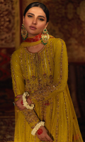 'Tabassum' is an elegant and a regal net dress is adorned in intricate gold and bronze handwork, which is enhanced and coordinated with pink resham that compliments the overall look of this piece. It is beautifully crafted with delicate details such as pearls, kora, dabka and ari hand-work which brings out delicate floral motifs on the bodice as well as on the border of each kali. The sleeves are styled with a bold floral motif with a linear handwork in the center, creating an aesthetically pleasing look. It is delicately finished with a dori and a pouch, tassels with pink/orange hues of banarsi finishing which gracefully uplifts the overall look of this dress. It is paired with straight raw silk lime green pants to complete the look of this piece. The lime green net dupatta features floral motif booti that highlights the look along with orange/pink banarsi finishing. The pouch can be made on customization as per order.