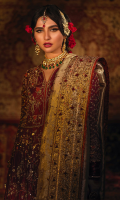 The most regal and traditional front open kalidaar in a deep crimson, embellished heavily with zardoze and resham. This kalidar is paired with a matching flary banarsi lehenga. The intricate embroidery with traditional detailing is done on a theme of birds and florals and rust double toned banarsi edgings adds to the wonderful flared cut. It is complemented by a gold tissue silk dupatta that is heavily embellished with handcrafted booties and borders. An exclusive gold tissue silk with handwork is added to give a complete look.
