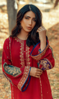 Sanem is a maroon straight shirt in pk raw silk paired with a matching tulip shalwar. It has intricate embroidery on front and sleeves with colored organza applique. A matching dupatta is given with handmade tassels.