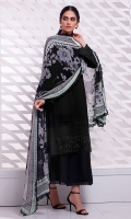 A narrow ban collar on this deep black kurta makes for a sleek and smart look enhanced with embroidered daaman and sleeves. Blooming flowers on a black chiffon dupatta add elegance to this ensemble. Complete the look with black flared pants finished with lace trim at the bottom.  *The height of the model is 5’6”. *The length of the shirt is 40 inches and the length of pants is 36 inches.