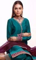 A chic shirt with ijaar pants and organza dupatta is highlighted with intricate embroidered neckline, sleeves and border. Pants are furthermore enhanced with delicate embroidered border at the bottom. This traditional and relaxed silhouette with versatile design can be dressed up depending on occasion.