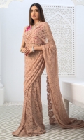 This elegant blush pink saree with magenta blouse decorated with silver hand embellished floral jhaal all over is a perfect choice for this festive season.