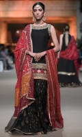 This chic yet modern block printed gharara pants are paired with black short shirt allured with heavily  embellished neckline, armhole and daaman with gold kora, dabka, sequins and maroon applique.  Back of the shirt is highlighted with embellished neckline.  You can pair it up with red chunri dupatta OR delicately mukesh worked three shaded dupatta finished with lace all around the edges.