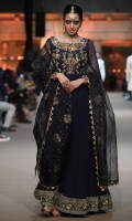 Rendered in bold shade of navy blue, TASAWUR is an elegant ensemble with heavily embellished body and neckline. Sleeves are furthermore enhanced with delicate mukesh work chann and embellished border on wrist.  This Intricate embroidered floral and geometric border all around instantly draws everyone attention.