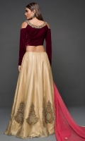 Opt for our glamorous choli sharara featuring maroon velvet with antique gold kora dabka neckline coordiNAted with gold organza sharara. It comes with melon pink net dupatta with sequins sprayed all over.