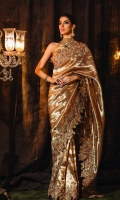 Laleh: One of our finest pieces the "Laleh" bronze gold banarsi tissue saree set exudes impeccable workmanship. This saree is crafted with the finest touch of our signature embroidery, intricately embellished with mesmerizing 3D flowers encrusted with Swarovski crystals, beads and sequence. The saree is paired with Banarsi Jamawar blouse.  6.5 meters Pure Banarsi Tissue 1.5 meters Banarsi Jamawar Blouse 