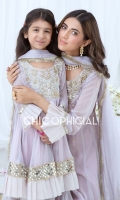 Breezy Pastel violet Kamdani chifon frock is embellished with traditional handwork of kora, pearls, beeds and stones adorned with statement mirror lace and organza frills paired up with straight cotton silk pants and chiffon dopatta having details of organza frills...
