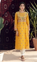 A traditional yellow number with Indian embroidery all over done in a paneled long shirt with yoke and gota detail.