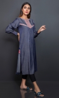 Chambre in grey color with a silk finish, done with a tribal embroidered patti on neckline, slit and yoke.