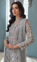 This ice blue long shirt crafted from pure silk organza is heavily ornamented with Crystal's and thread work. This luxurious outfit is finished with raw silk pants and a pearl embellished dupatta for an ethereal look.