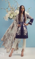 A navy blue and cream color-blocked printed lawn shirt with gold elements with a fusion of Uzbek embroidery and Chrysanthemum flowers. Floral embroidered bunches on organza are complemented by a cream Jacquard Dupatta.