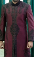 Maroon suiting fabric sherwani stitched in front open style and designed with flok print details on front back and sleeves and attached black velvet collar and sleeves finishing 