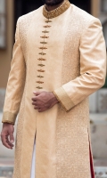 Self jamavar light peach color fabric sherwani designed with Mughal ornaments thread embroidery on front and back panel also highlited african motifs zardozi detail on collar,front and back motif