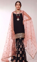 A traditional yet glamorous look for an evening under the stars. NAYAB is rendered with beautiful embellished border in mirror work and embroidered floral details. This alluring shirt is paired with traditional gharara pants accentuated with embroidered floral bunches. It comes with peachy pink organza dupatta filled with embroidered polka dots and gotta lace finishing all over the edges.