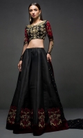Adorned in a black choli sharara embellished with antique gold detailing on the neckline with contrasting embroidery in shades of red on sleeves and sharara, this attire will elevate your style. It comes with black net embellished dupatta.